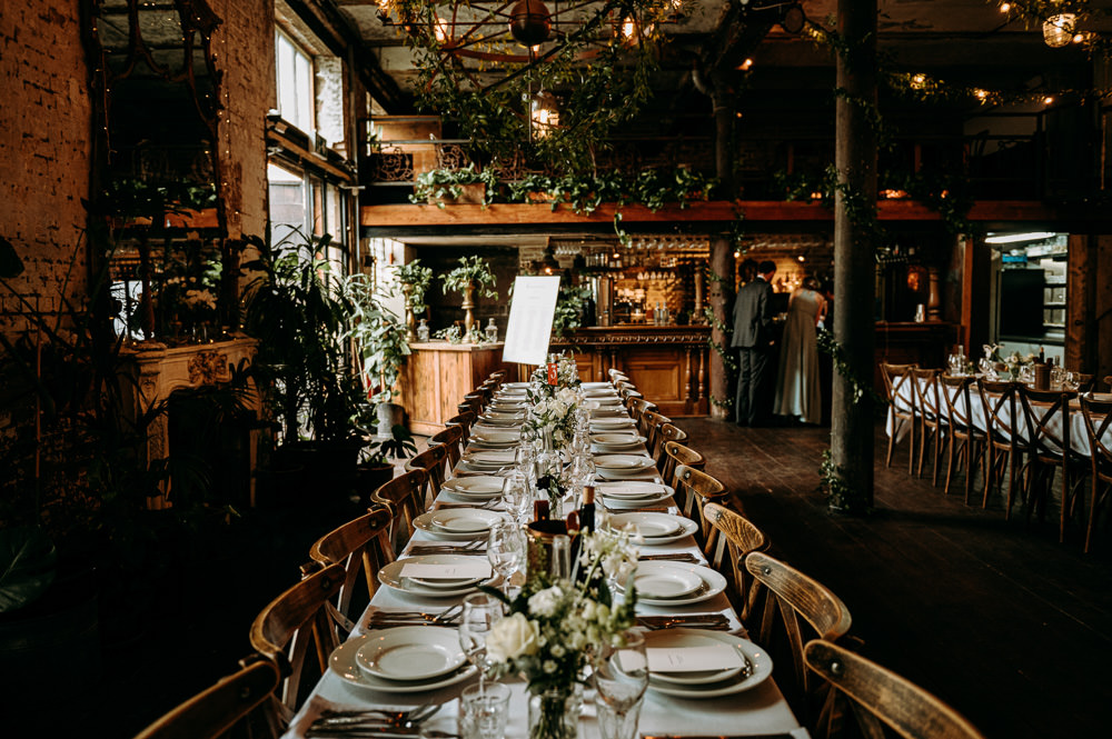 Rustic Wooden Long Table Greenery White Flowers Decor Bethnal Green Wedding Andrew Brannan Photography