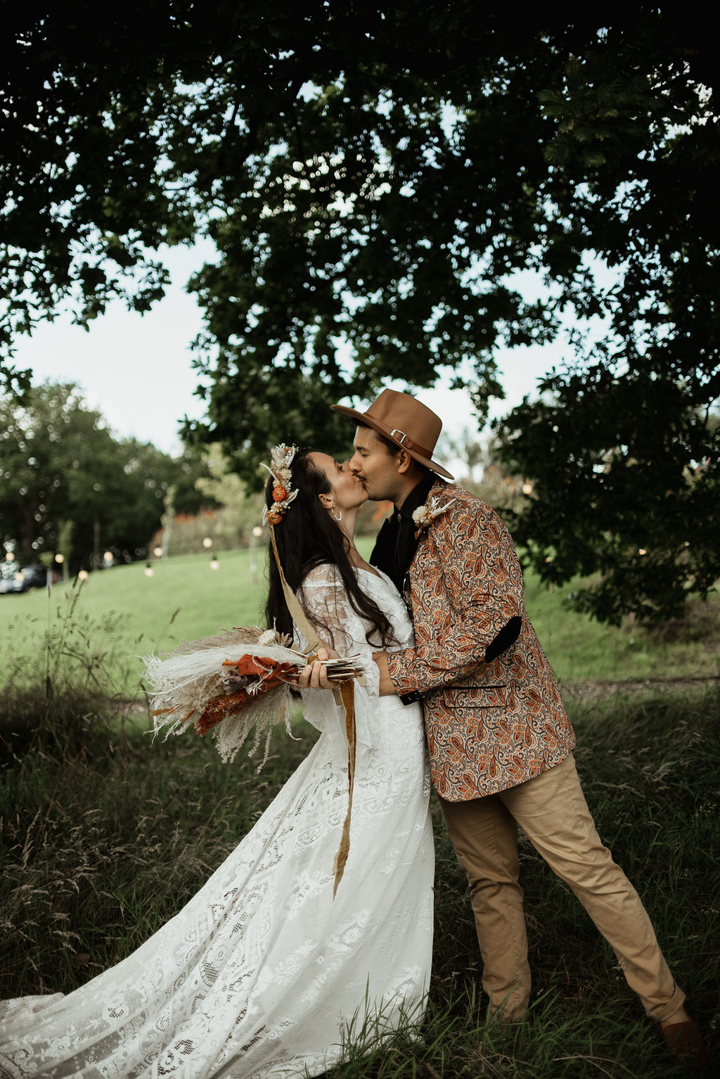 Groom Floral Print Suit Fedora Hat Boho Tipi Wedding Ideas Sara Ribera Photography
