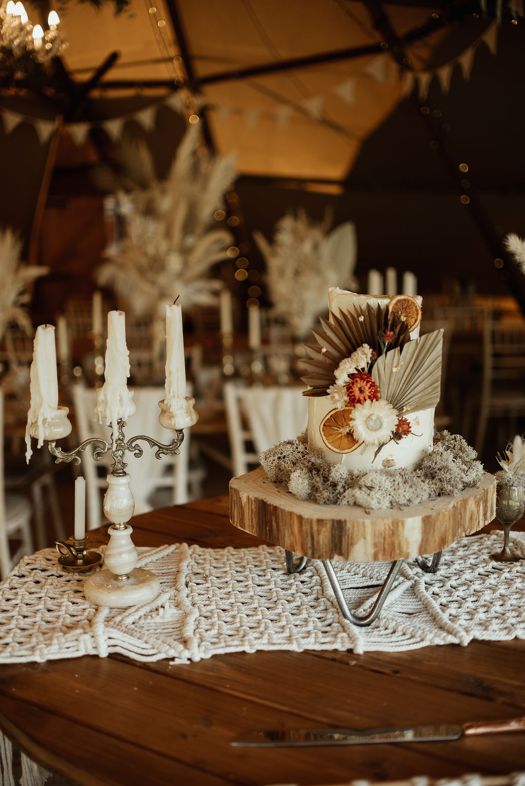 Two Tier Rustic Cake Dried Palm Leaf Flowers Log Slice Boho Tipi Wedding Ideas Sara Ribera Photography