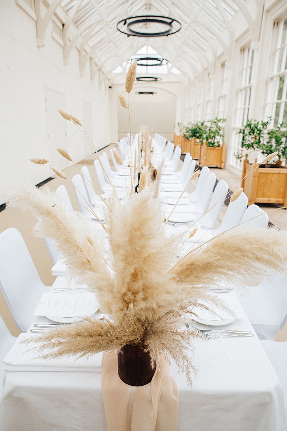 Long Table Decor Pampas Grass Centrepiece Bottles Gold Candlesticks Cream Silk Runner Orangery Ingestre Wedding Jenny Rose Photography