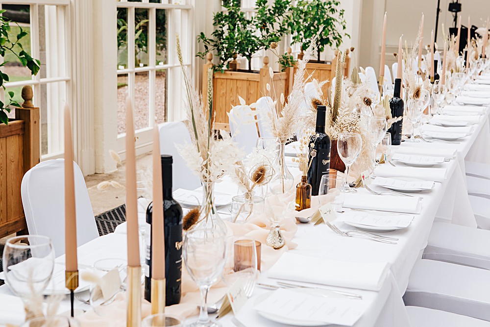 Long Table Decor Pampas Grass Centrepiece Bottles Gold Candlesticks Cream Silk Runner Orangery Ingestre Wedding Jenny Rose Photography