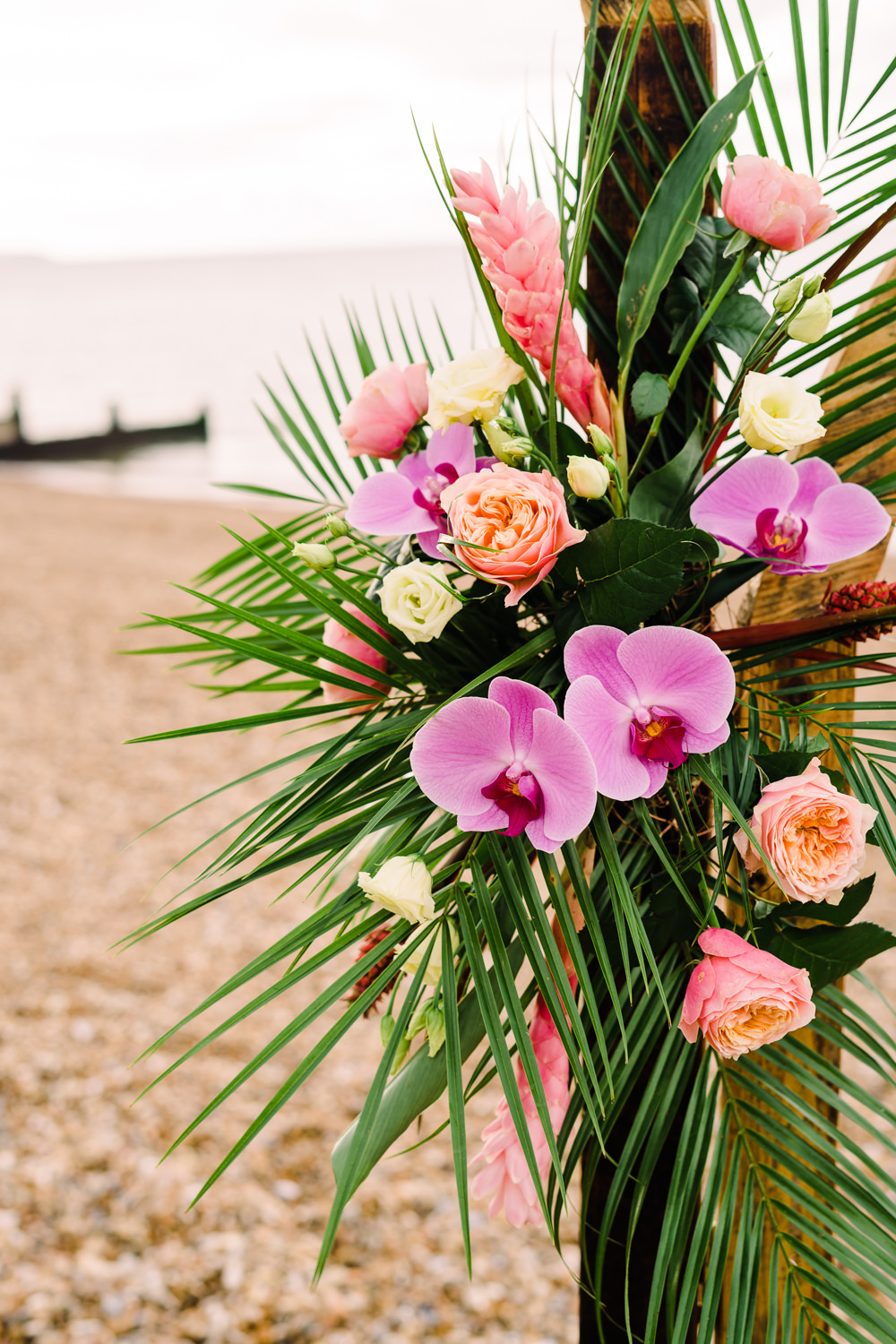 Tropical Flower Arrangement Palms Flamingo Orchid Staycation Wedding Jade Touron Photography