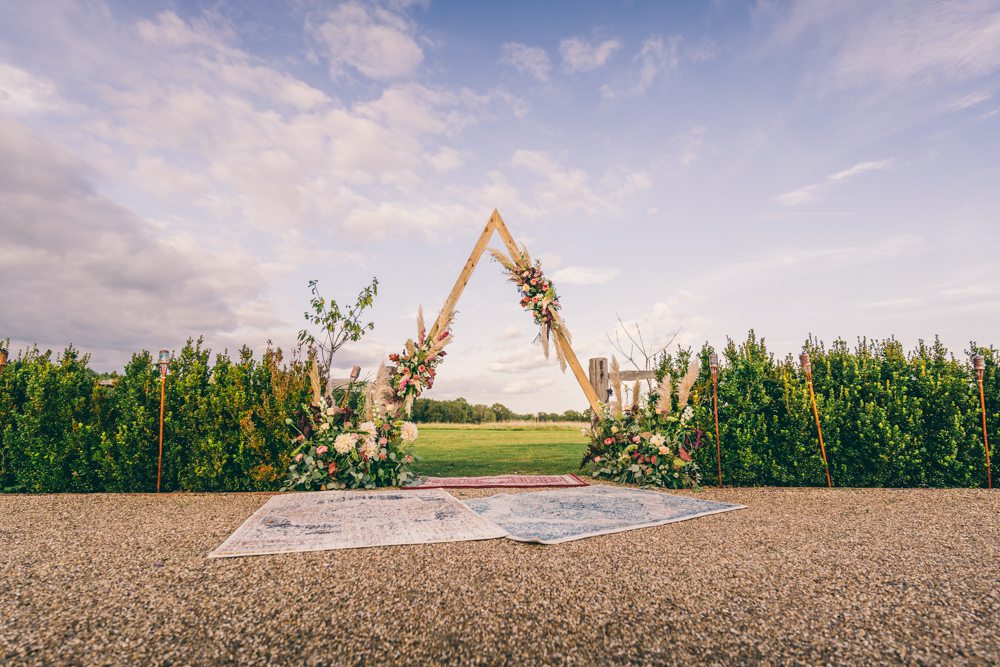 Woodland Ceremony Rug Aisle Pampas Grass Triangle Arch Backdrop Surrey Farm Wedding Rob Tarren Photography