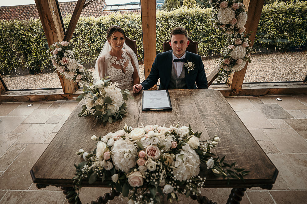 Ceremony Table Flowers Hexagon Arch Backdrop Swancar Farm Wedding MattMoore Photography