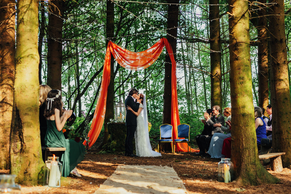 Woodland Aisle Ceremony Candles Orange Fabric Arch Yorkshire Woodland Wedding James and Lianne