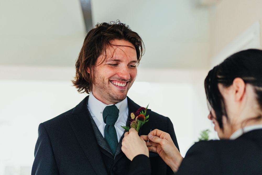 Groom Suit Navy Green Tie Buttonhole Flowers Yorkshire Woodland Wedding James and Lianne
