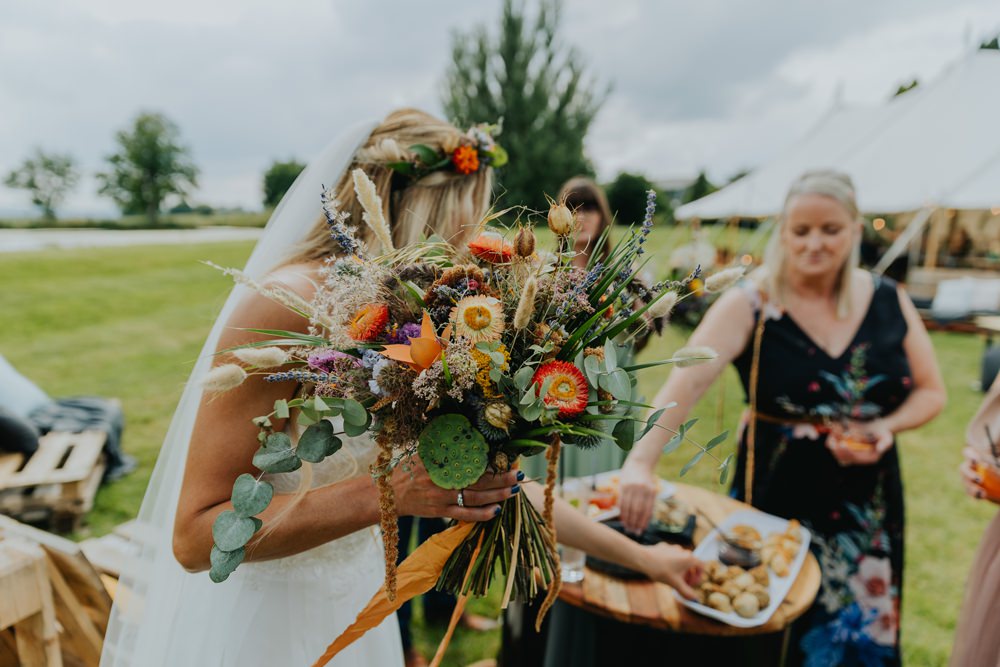 Bouquet Flowers Bride Bridal Orange Greenery Grass Cheswell Grange Wedding James Merrick Photography