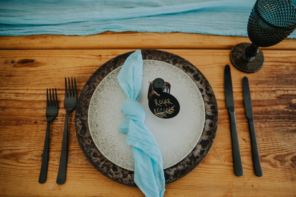 Place Setting Plate Blue Knot Napkin Cheswell Grange Wedding James Merrick Photography