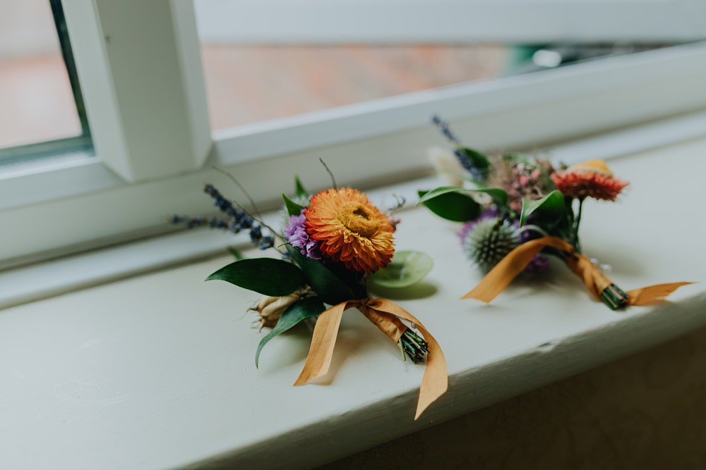 Buttonhole Flowers Orange Cheswell Grange Wedding James Merrick Photography