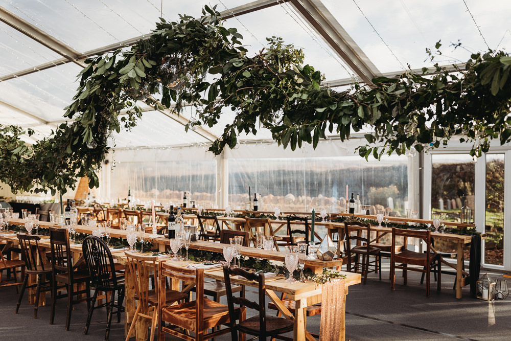 Clear Marquee Greenery Swag Fairy Lights Wooden Long Tables Clophill Eco Lodges Wedding ThymeLane Photography
