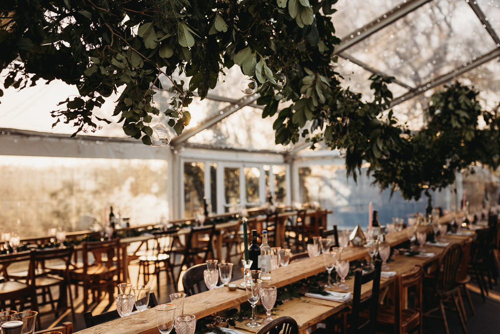 Clear Marquee Greenery Swag Fairy Lights Wooden Long Tables Clophill Eco Lodges Wedding ThymeLane Photography