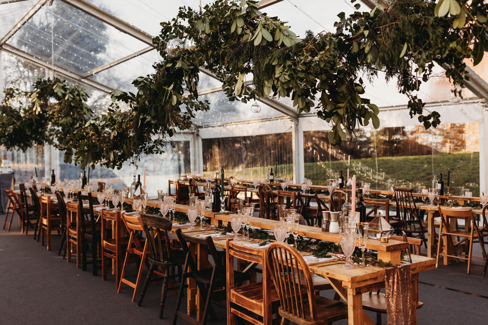 Clear Marquee Greenery Swag Fairy Lights Wooden Long Tables Clophill Eco Lodges Wedding ThymeLane Photography