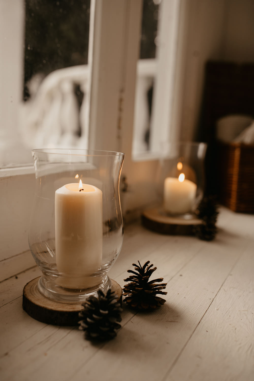 Hurrican Lamp Candles Log Slice Pine Cone Decor December Wedding Ideas Megan Donati Photography