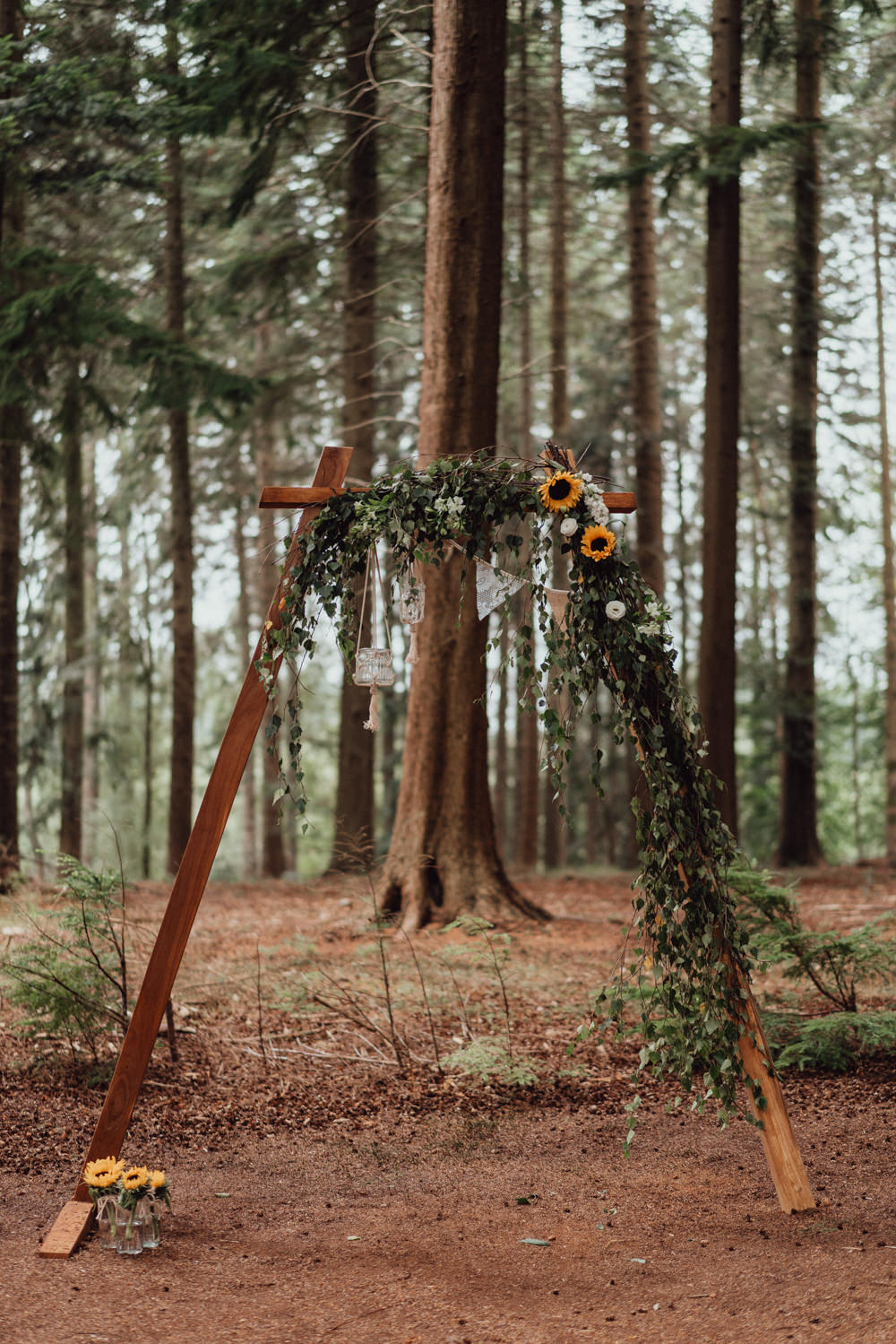 Wooden Arch Ceremony Backdrop Greenery Sunflower Hampshire Woodland Wedding Emily & Steve