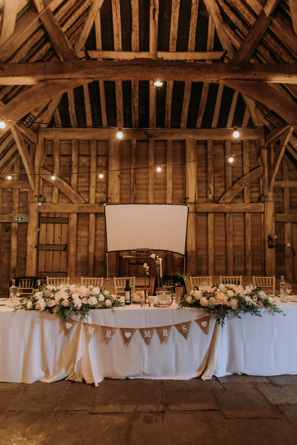 Top Table Flowers Bunting Decor Hertfordshire Barn Wedding Isabelle Elliott Photography