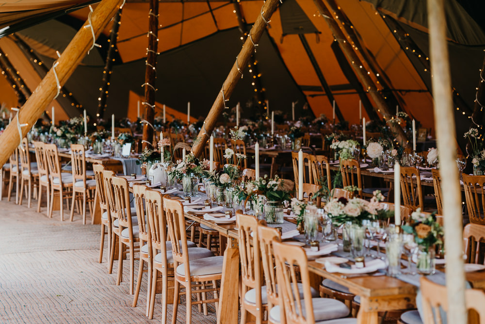 Tipi Decor Long Wooden Tables Greenery Hertfordshire Farm Wedding Jonny Gouldstone Photography