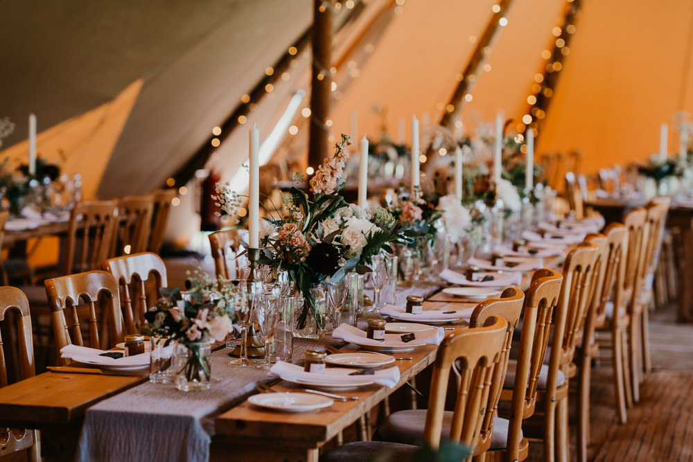 Tipi Decor Long Wooden Tables Greenery Candles Hertfordshire Farm Wedding Jonny Gouldstone Photography