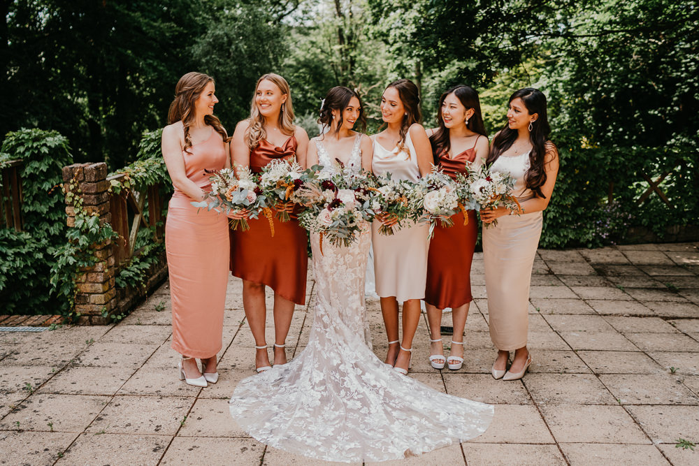 Bridesmaids Terracotta Rust Pink Blush Dresses Hertfordshire Farm Wedding Jonny Gouldstone Photography