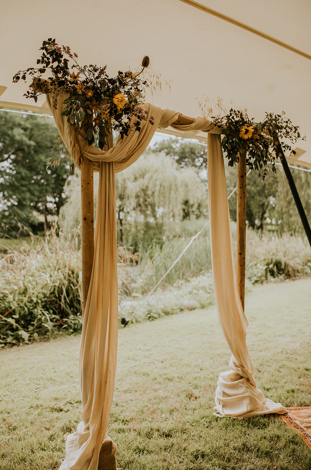 Ceremony Backdrop Flower Arch Fabric Norfolk Barn Wedding Aurora Grey Photography