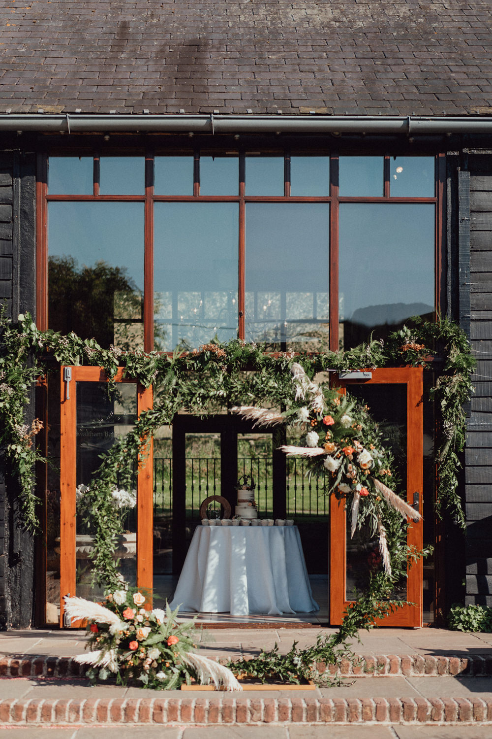 Moongate Flower Arch Backdrop Greenery Pampas Grass South Downs Barn Wedding Emily Steve