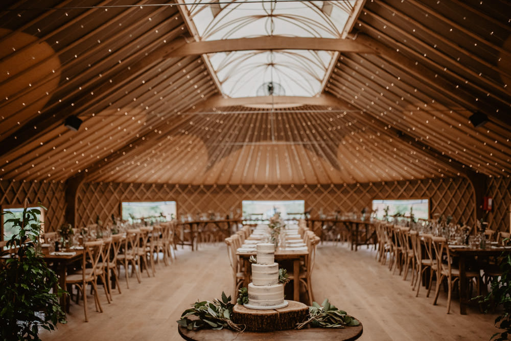 Yurt Reception Fairy Lights Long Wooden Tables Thorpe Garden Wedding Camilla Andrea Photography