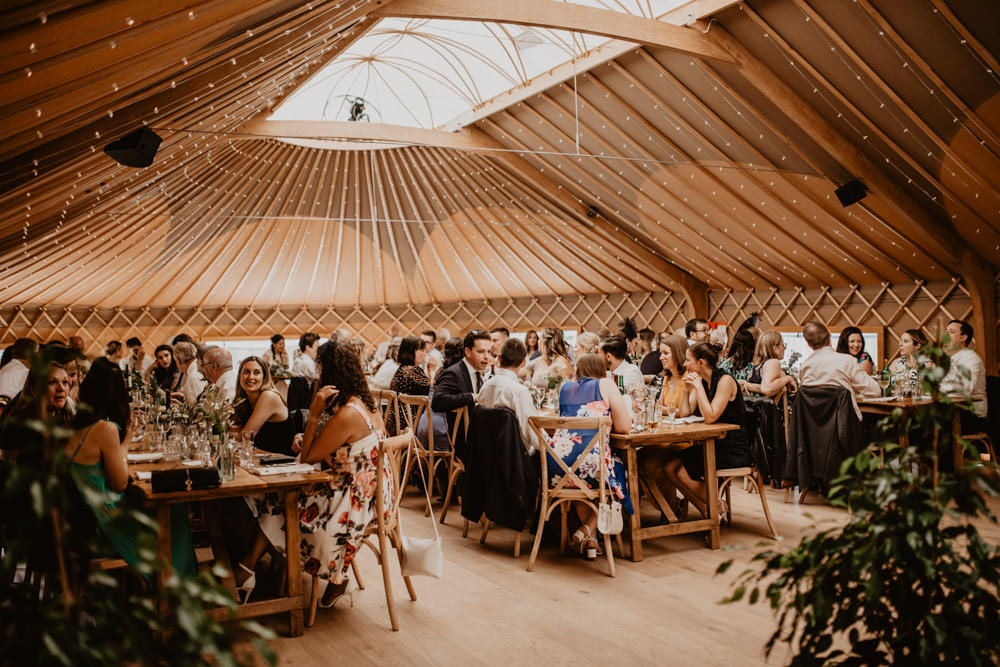 Yurt Reception Fairy Lights Long Wooden Tables Thorpe Garden Wedding Camilla Andrea Photography