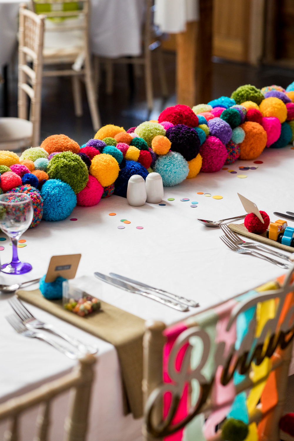Rainbow Pom Pom Wool Decor Table Woodhouse Barn Wedding John Wellings