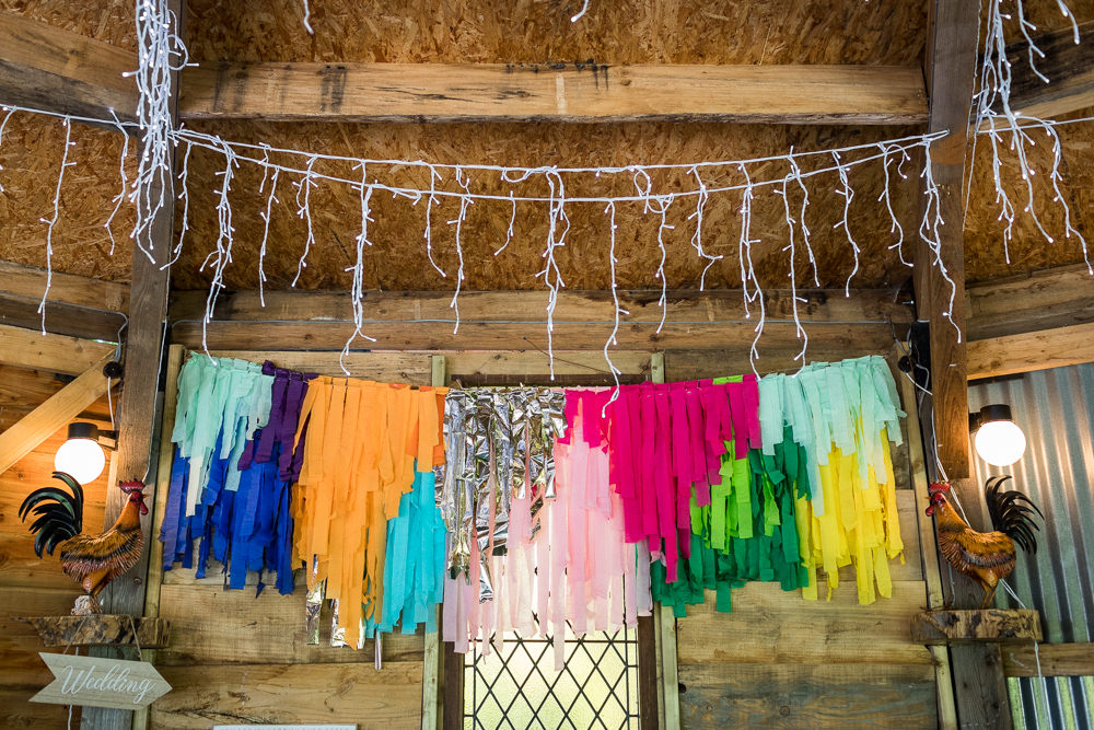 Rainbow Streamer Tassel Backdrop Woodhouse Barn Wedding John Wellings