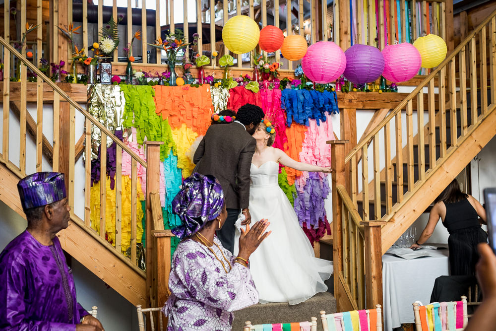 Rainbow Streamer Tassel Backdrop Woodhouse Barn Wedding John Wellings
