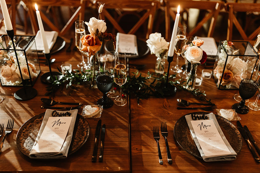 Rustic Wooden Tables Long Flowers Candles Place Setting Autumn Forest Wedding Emma Lawson Photography