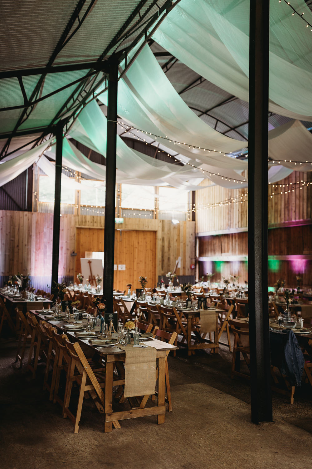 Reception Hanging Fabric Fairylights Long Tables Decor Barn Norfolk Wedding Thyme Lane Photography