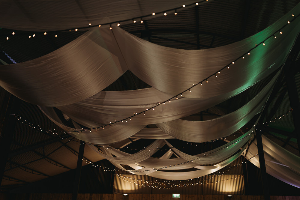 Reception Hanging Fabric Fairylights Barn Norfolk Wedding Thyme Lane Photography