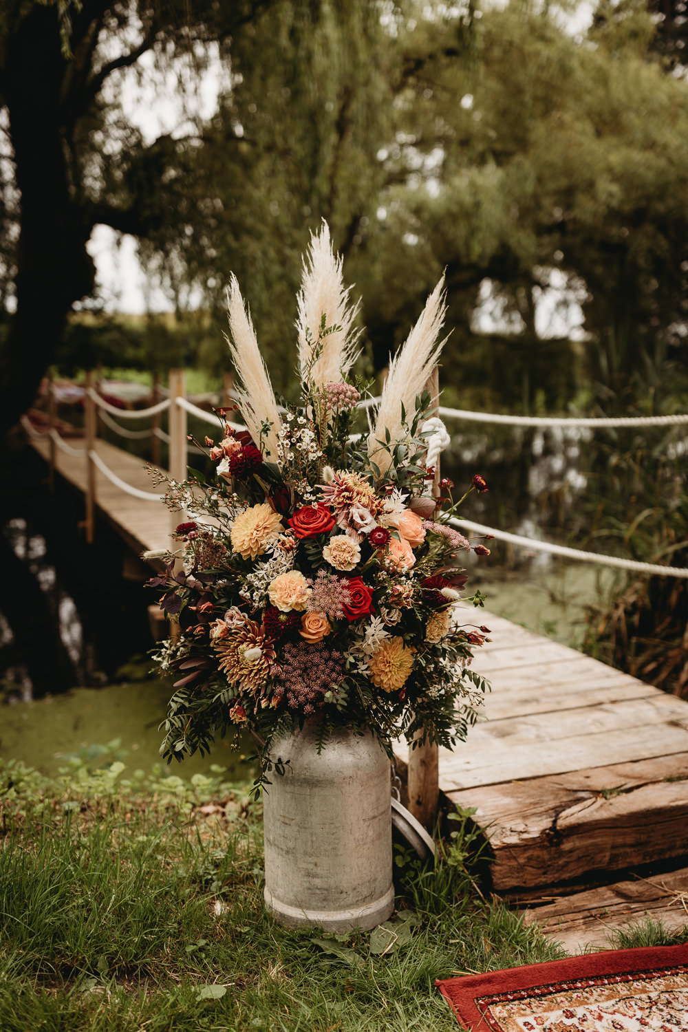 Aisle Flowers Milk Churn Pampas Grass Barn Norfolk Wedding Thyme Lane Photography