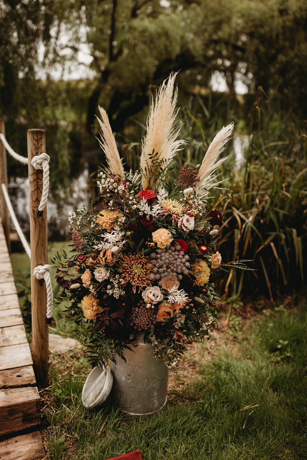 Aisle Flowers Milk Churn Pampas Grass Barn Norfolk Wedding Thyme Lane Photography