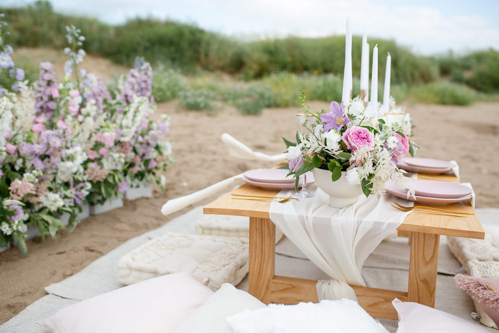 Low Wooden Table Candles Pink Lilac Flowers Decor Beach Picnic Wedding Ellie Lou Photography