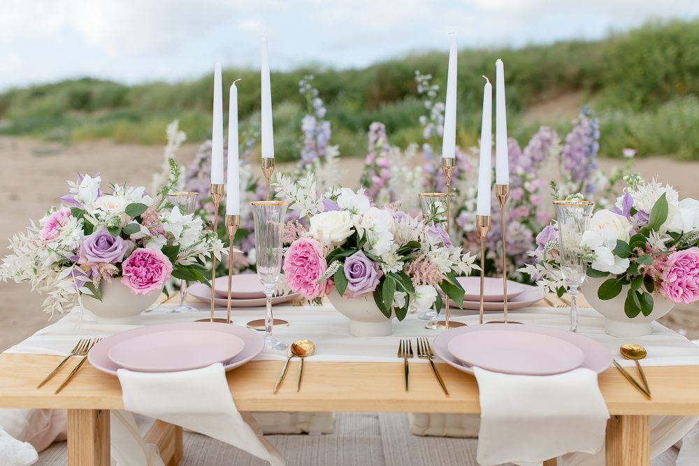 Low Wooden Table Candles Pink Lilac Flowers Decor Beach Picnic Wedding Ellie Lou Photography