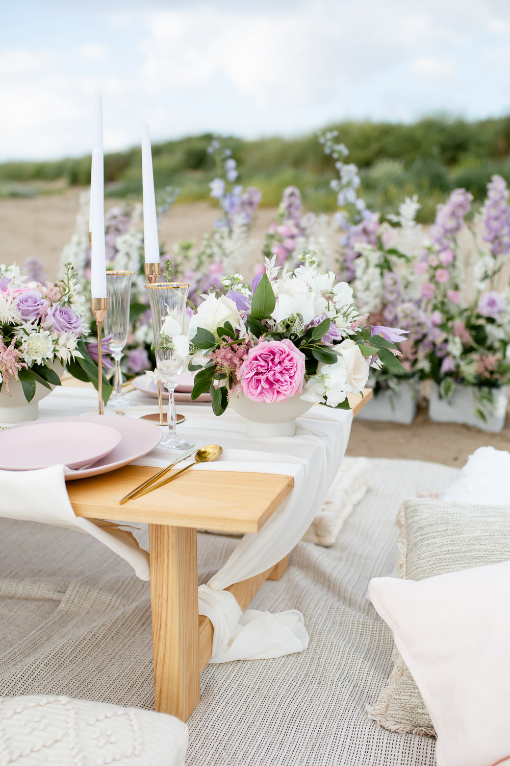 Low Wooden Table Candles Pink Lilac Flowers Decor Beach Picnic Wedding Ellie Lou Photography