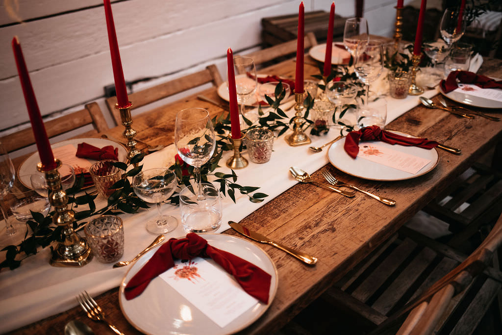 Wooden Table Red Candles Napkins Greenery Decor Bold Wedding Ideas Pasha Jansen Photography