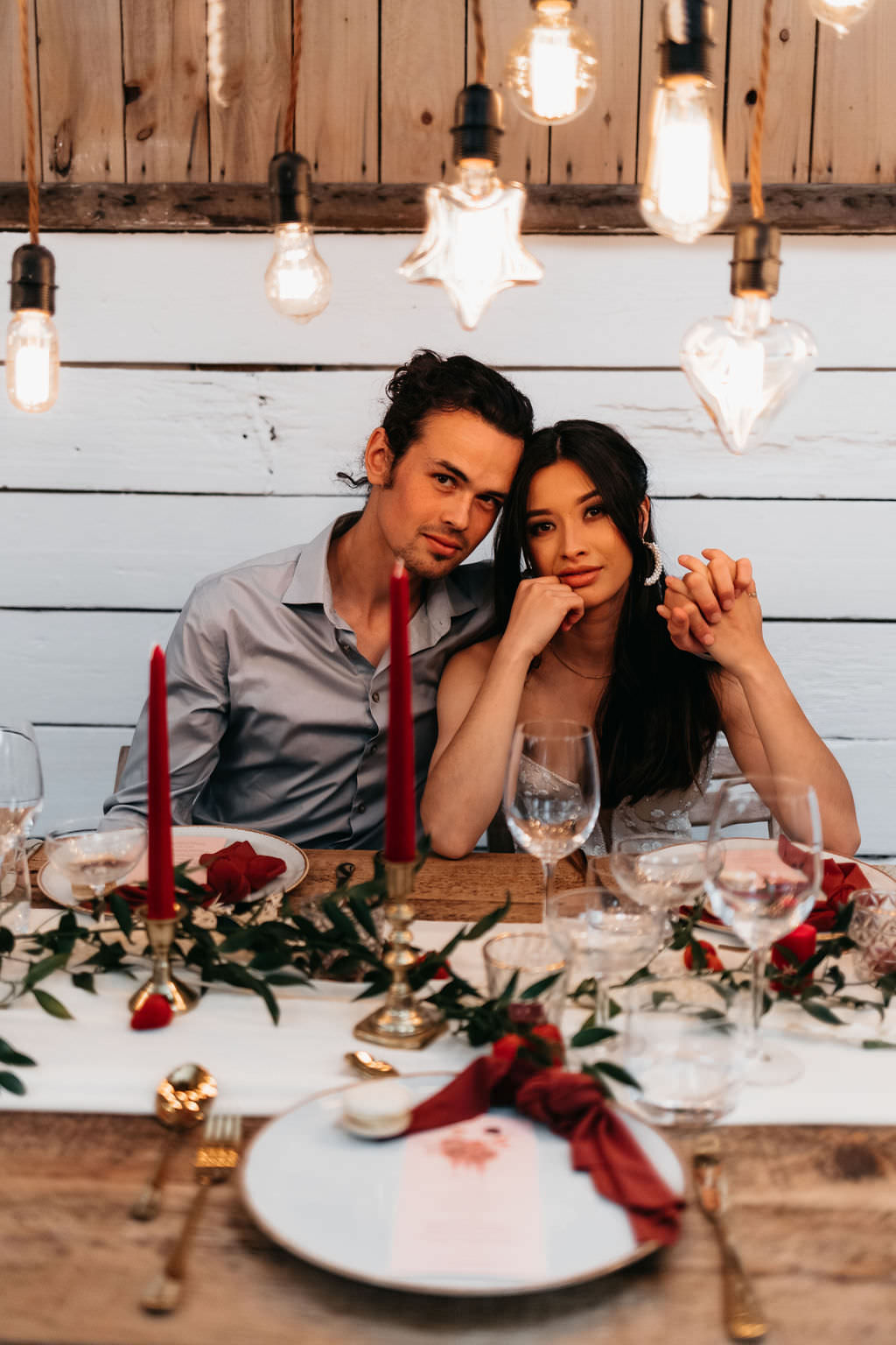 Festoon Lighting Wooden Table Red Candles Napkins Greenery Decor Bold Wedding Ideas Pasha Jansen Photography