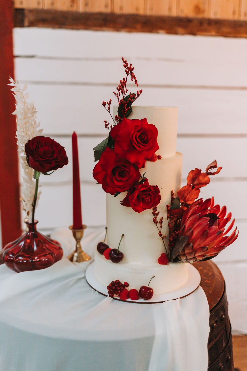 White Iced Cake Red Flowers Bold Wedding Ideas Pasha Jansen Photography