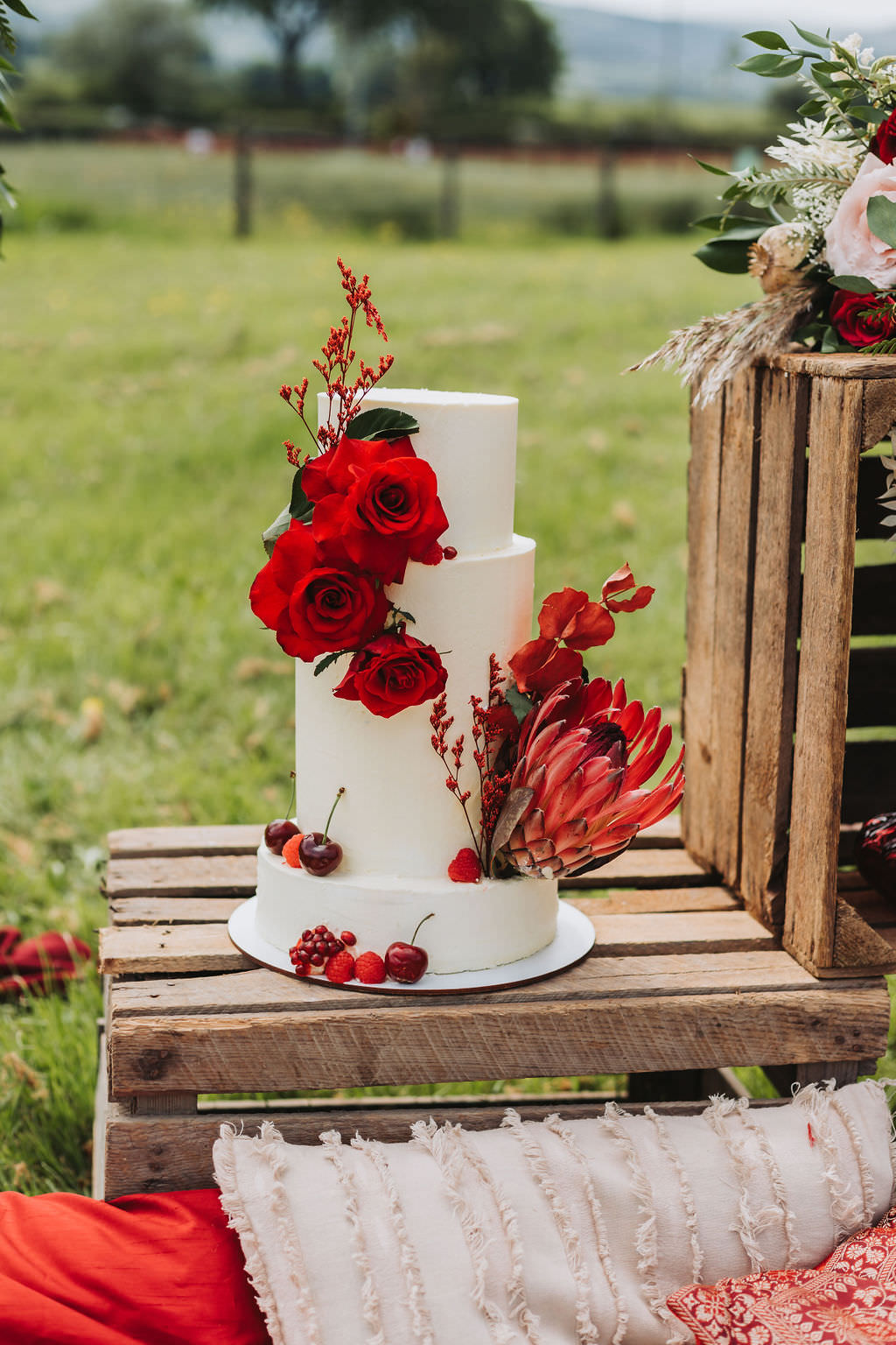 White Iced Cake Red Flowers Bold Wedding Ideas Pasha Jansen Photography