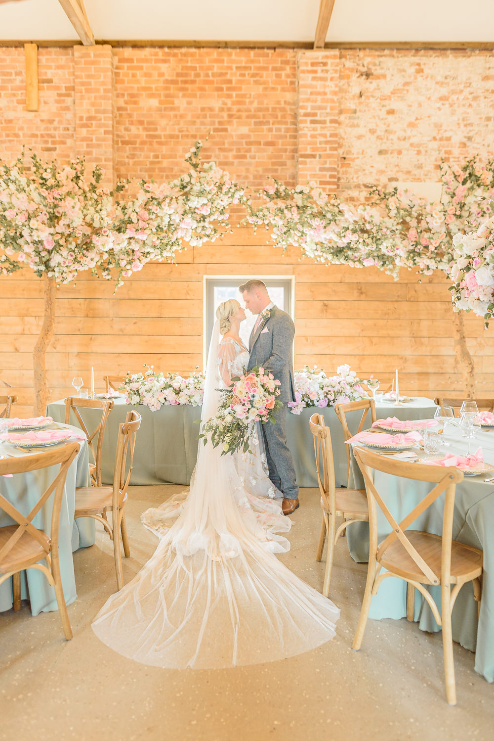 Barn Decor Pink Flowers Centrepieces Trees Burlton Manor Wedding Tanya Flannagan Photography