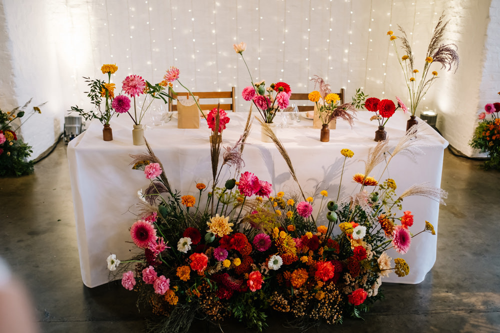 Top Table Flowers Colourful Dahlia London Warehouse Wedding Kristian Leven Photography