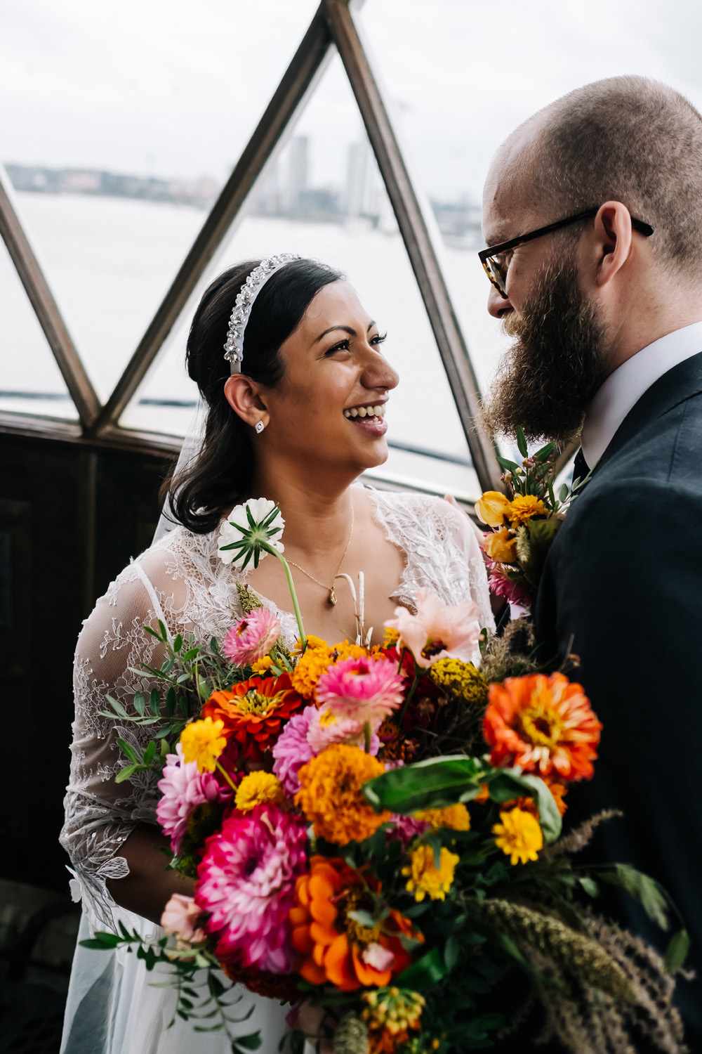 Bouquet Flowers Bride Bridal Colourful Yellow Orange Pink London Warehouse Wedding Kristian Leven Photography