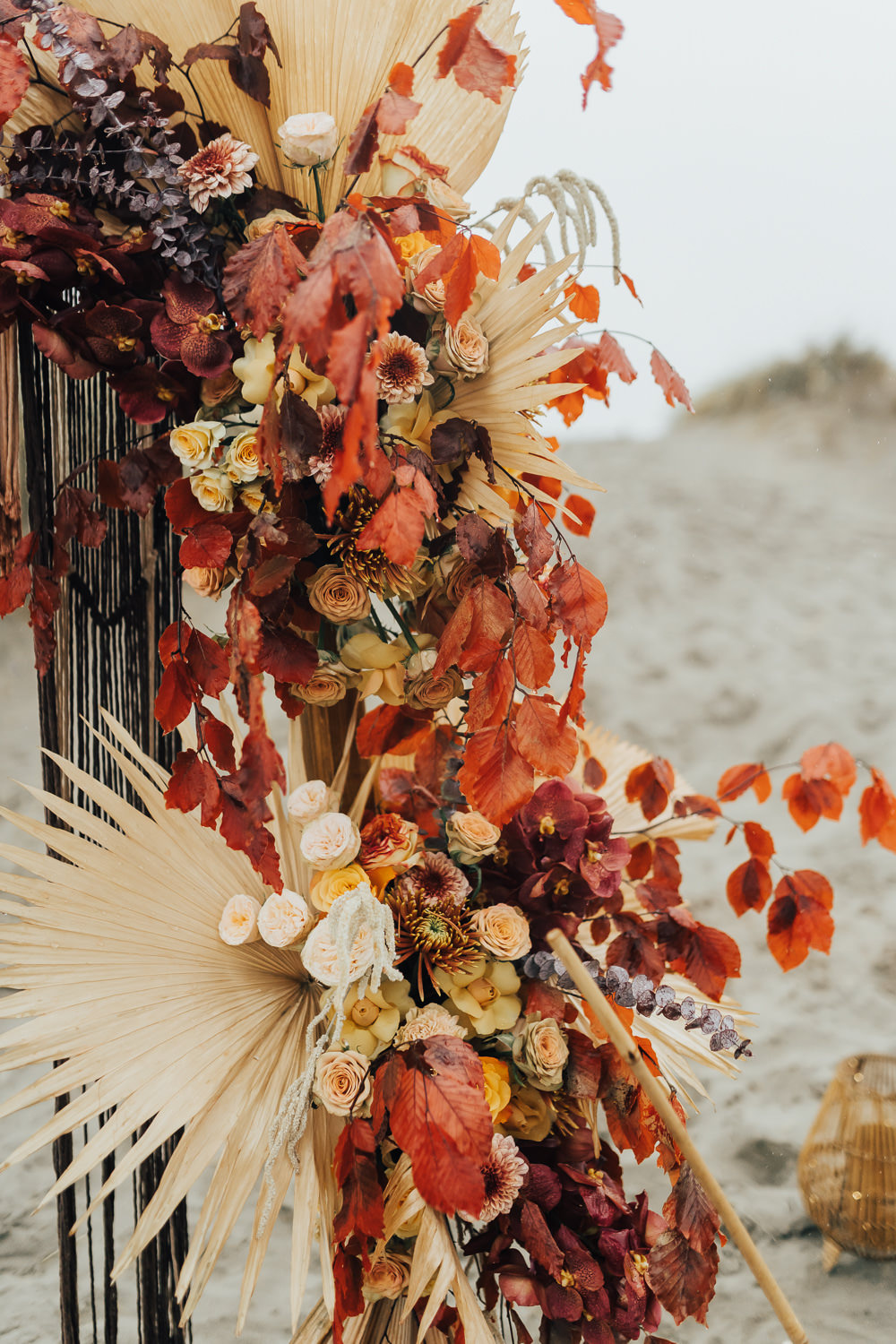 Flower Arrangement Orange Rose Palm Leaf Boho Beach Elopement Rebecca Carpenter Photography