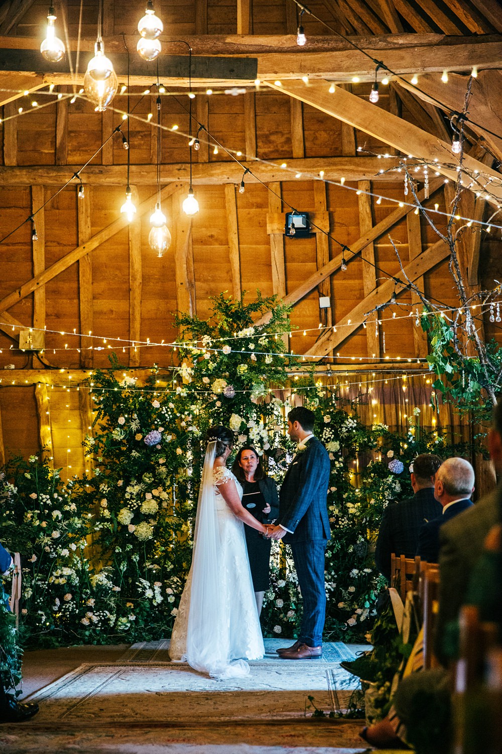 Barn Ceremony Flower Backdrop Installation Little Tey Barn Wedding Three Flowers Photography