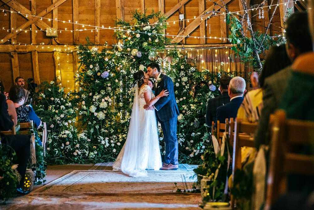 Barn Ceremony Flower Backdrop Installation Little Tey Barn Wedding Three Flowers Photography