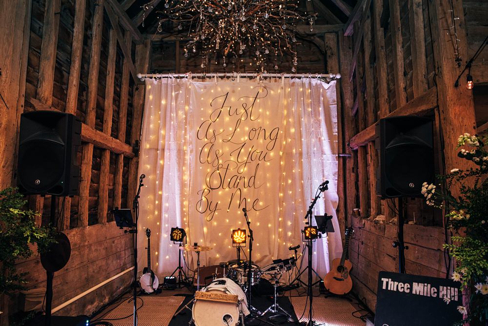 Banner Sign Dancefloor Fairy Light Curtain Little Tey Barn Wedding Three Flowers Photography