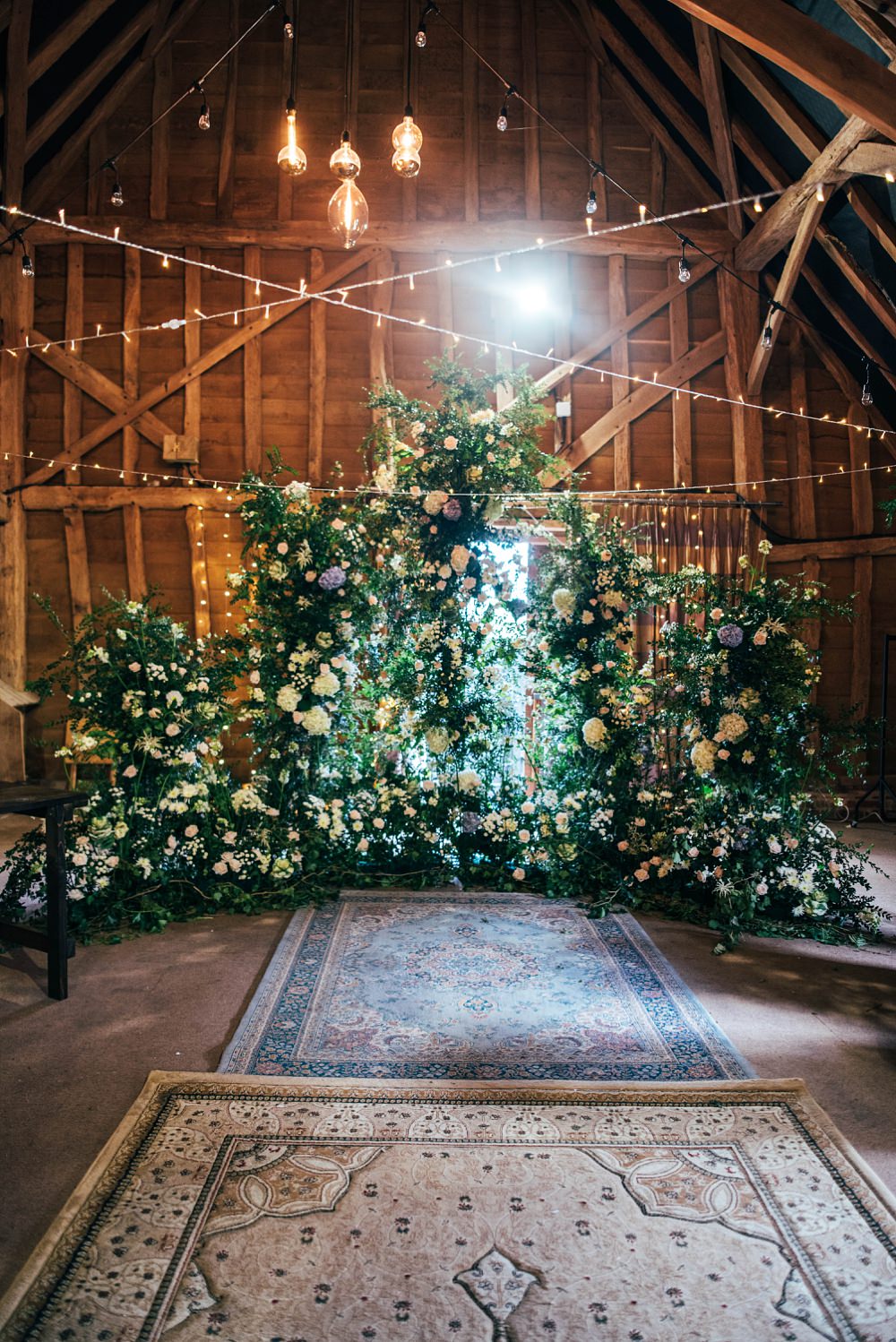 Barn Ceremony Flower Backdrop Installation Little Tey Barn Wedding Three Flowers Photography