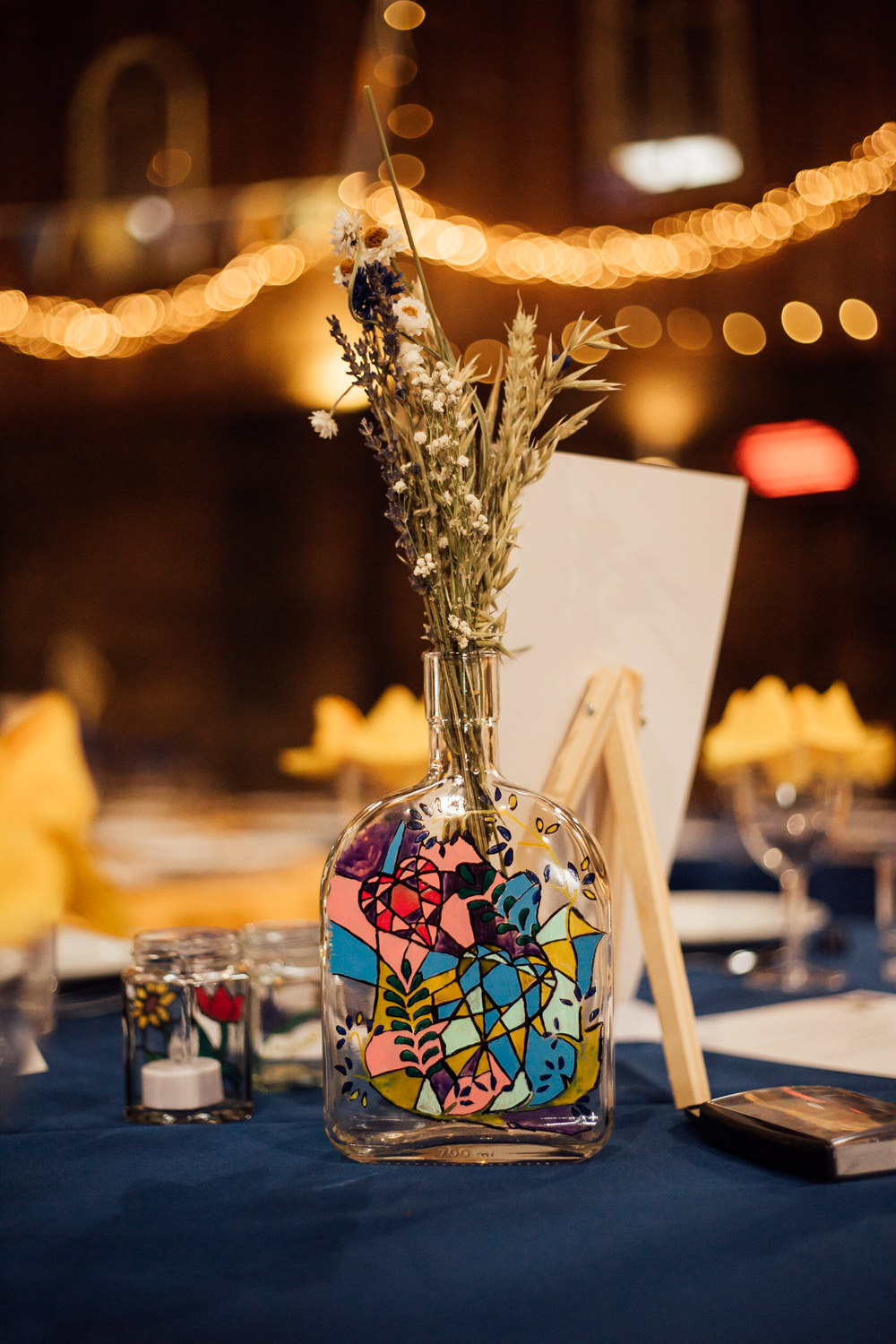 Lower Damgate Farm Wedding Anna Rose Heaton Photography Painted Glass Bottle Dried Flower Centrepiece Decor